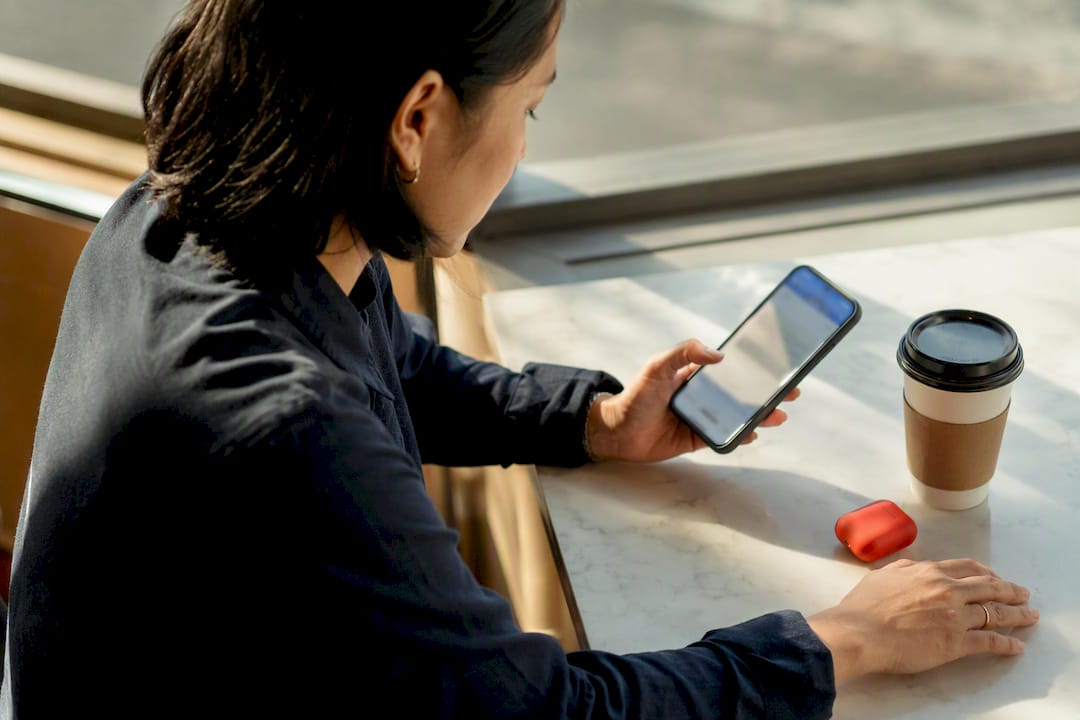 Owner checking landing page on mobile